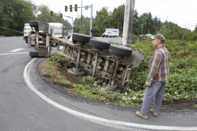 Tipped over truck stops traffic on Day Road