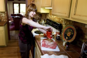 Phyllis Devine prepares her award-winning ‘falso magro’ at home.