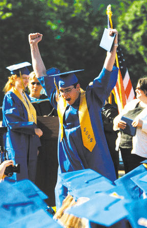 Michael Kushner’s diploma on high signals the senior’s joy at Saturday's Bainbridge High School graduation.