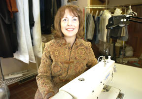 Vivian Chesterly is surrounded by works-in-progress at JSM Tailors