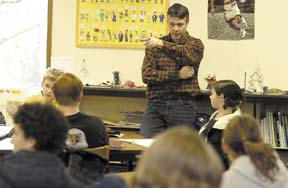 Eagle Harbor High School teacher Ken Ragsdale asks his class to interpret images in contemporary media in light of the racial issues raised in the Gettysburg Address. The school