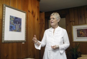 Pam Christiansen of Return To Creativity shows the exhibition space of the organization.