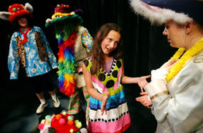 Rehearsing are Sasha Carter (center) as Alice