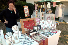 Mary Edwards sells hand-crafted jewelry at the street bazaar