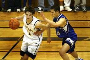 Nick Fling runs the point during the game against Seattle Prep Jan. 5. He and the other Spartans will be in Seattle - weather permitting - competing in two different basketball tournaments over the holiday weekend.