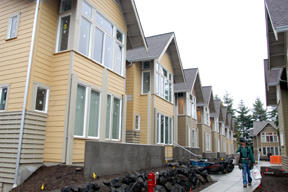 Workers this week are still putting the finishing touches on interiors at the Camelia apartment homes on Ihland Place