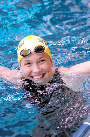 Bainbridge senior Emily Silver flashes a smile while cooling down after the 50-freestyle race.