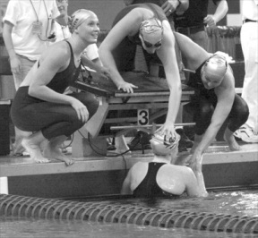 Emily Silver (left) and other members of the University of California relay team celebrate after winning the 800-yard freestyle relay at the women’s NCAA swimming championships at the University of Minnesota March 10. Silver was a member of three Cal relay teams that set several records at the meet.