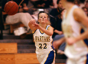 Spartan guard Toren Johnson passes the ball to a teammate during Tuesday’s contest against Ingraham. The wins over the Rams