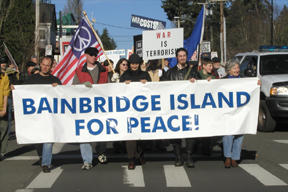 The first ranks of more than 400 demonstrators rally for peace on Madison Avenue Saturday.