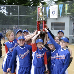 The victorious Diamonds team hoists the trophy after edging the Blaze in the softball championship game Friday evening at Strawberry Hill Park fields. The team included (L-R) Haley Brandt-Erichsen