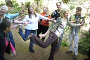 It doesn’t get hotter. Mary Jensen (right) and members of the Heels of Thunder Dance Group rehearse on Jensen’s deck while Natural Disaster plays a rollicking rendition of “Sleepy Eyed John.”