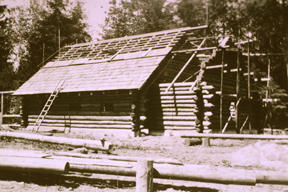 The Camp Yeomalt cabin under construction in 1935. The building was a Works Progress Administration project.