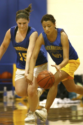 Lindsey Bratonia (above) goes for the steal against Angela Failla. The senior co-captain will lead a experienced team into battle this season.