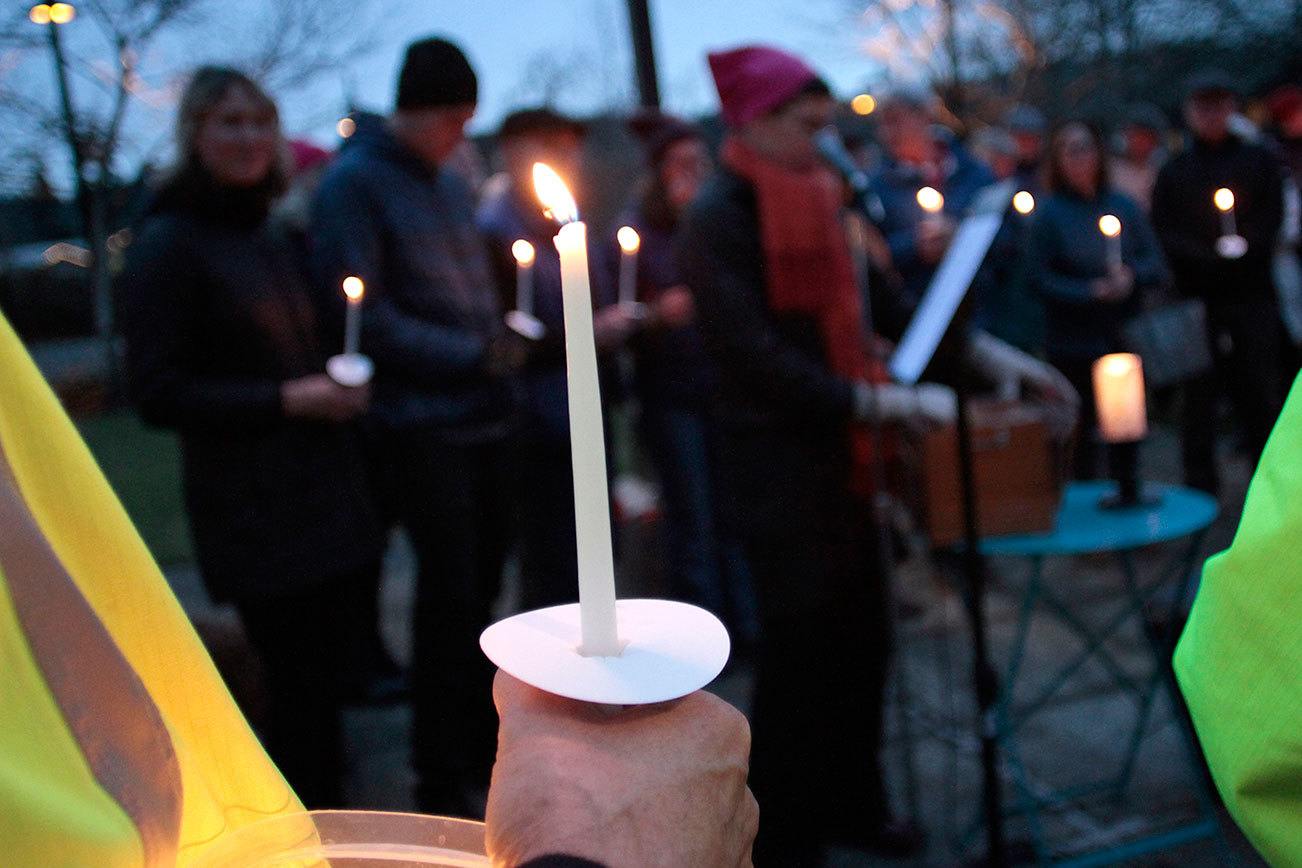 Islanders gather for Inauguration Day Candlelight Vigil