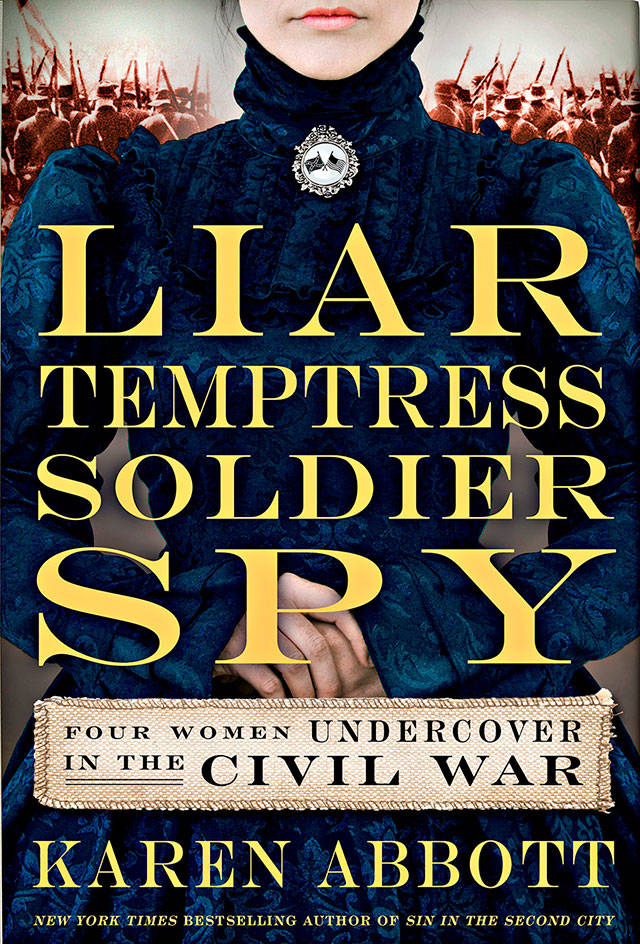 Book club meets for discussion of ‘Liar, Temptress, Soldier, Spy’