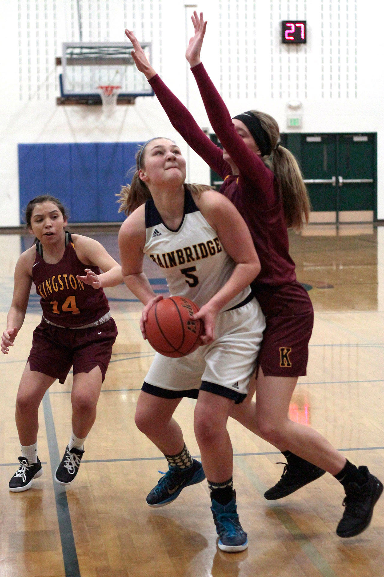 Spartan sophomore co-captain Grace Carson eyes the hoop. (Luciano Marano | Bainbridge Island Review)