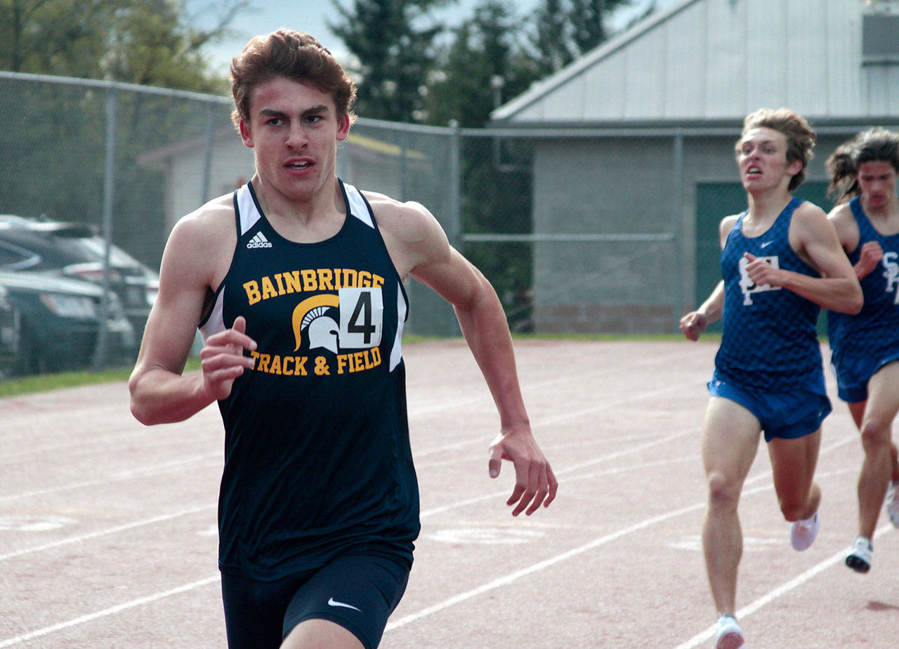 Luciano Marano | Bainbridge Island Review - Speedy Spartan Carlo Ruggiero finished in second place and set a new personal record in the 1600-meter event at the recent four-school tack and field meet at Bainbridge High School.