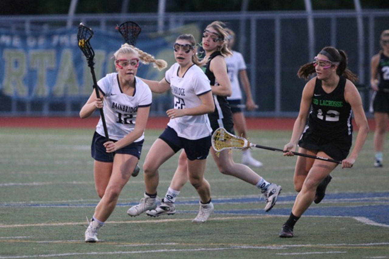 Eleanor King makes her way up the field in the Spartans’ Senior Night win. (Lara Sweeney photo)