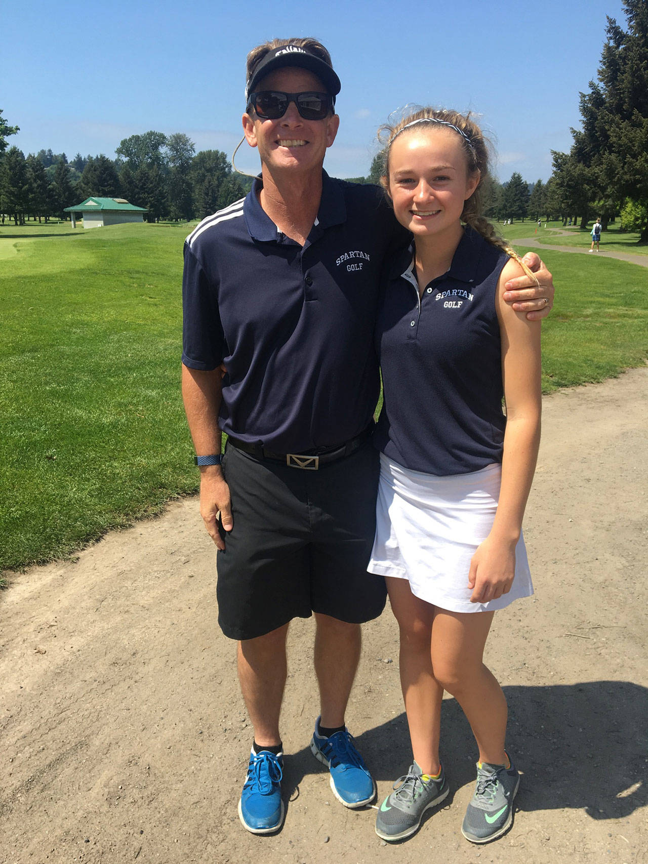 Photo courtesy of Ian Havill | Bainbridge High School’s Kendall Havill (pictured here with her father/coach Ian Havill) finished in 22nd place overall at the 2018 Seaking District 2 Girls Golf Championship.