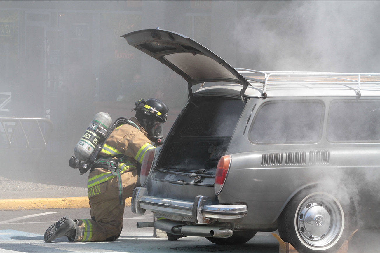 Classic VW catches fire at Island Village Shopping Center