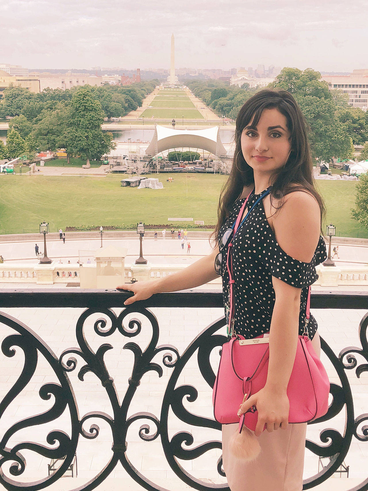 Anisa Ashabi stands for a photo on the Speaker’s Balcony of the U.S. Capitol Building during her internship. (Photo courtesy of Elizabeth Dourley)