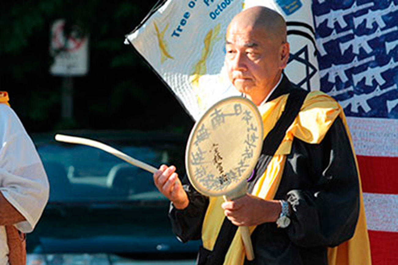 Bainbridge says ‘Enough’ at vigil against gun violence | Photo gallery