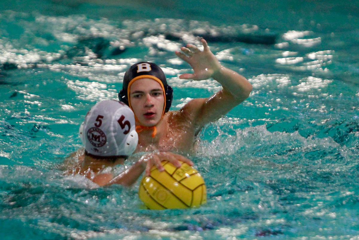 Luciano Marano | Bainbridge Island Review - The Bainbridge High School varsity boys water polo team battled back from an early deficit Tuesday to score a 13-11 win against their visiting rivals from Mercer Island.