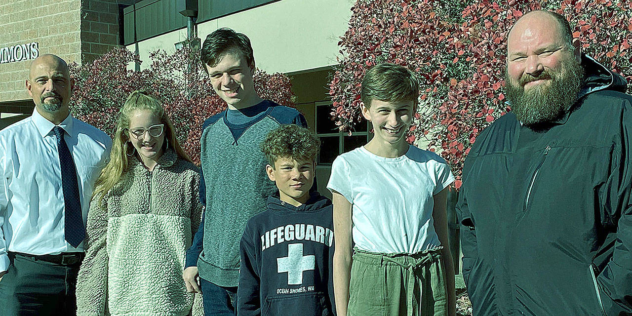 Woodward Middle School Principal Jeff Hale stands with Students of the Month for October; Camille Zaro, Ben Van Patten, Nash Eyrich, and Matilda Sykes. Also pictured is Associate Principal Travis Tebo. (Photo courtesy of Woodward Middle School)