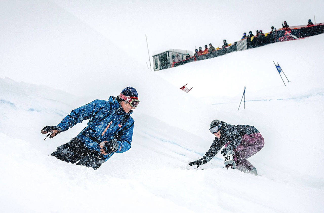 Kevin McHugh photo | Devon Raney following Tom Burt down the course at the 30th annual Mount Baker Legendary Banked Slalom in 2016. Raney’s new memoir, “Still Sideways,” is available now in print and audiobook versions from Patagonia.