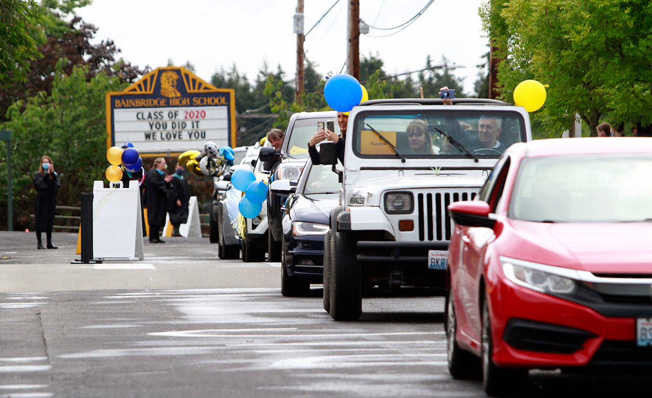 Luciano Marano | Bainbridge Island Review - Saturday’s drive-thru commencement saw students, families and faculty do their best to maintain social distancing while celebrating the Class of 2020 of Bainbridge High School and Eagle Harbor High School.