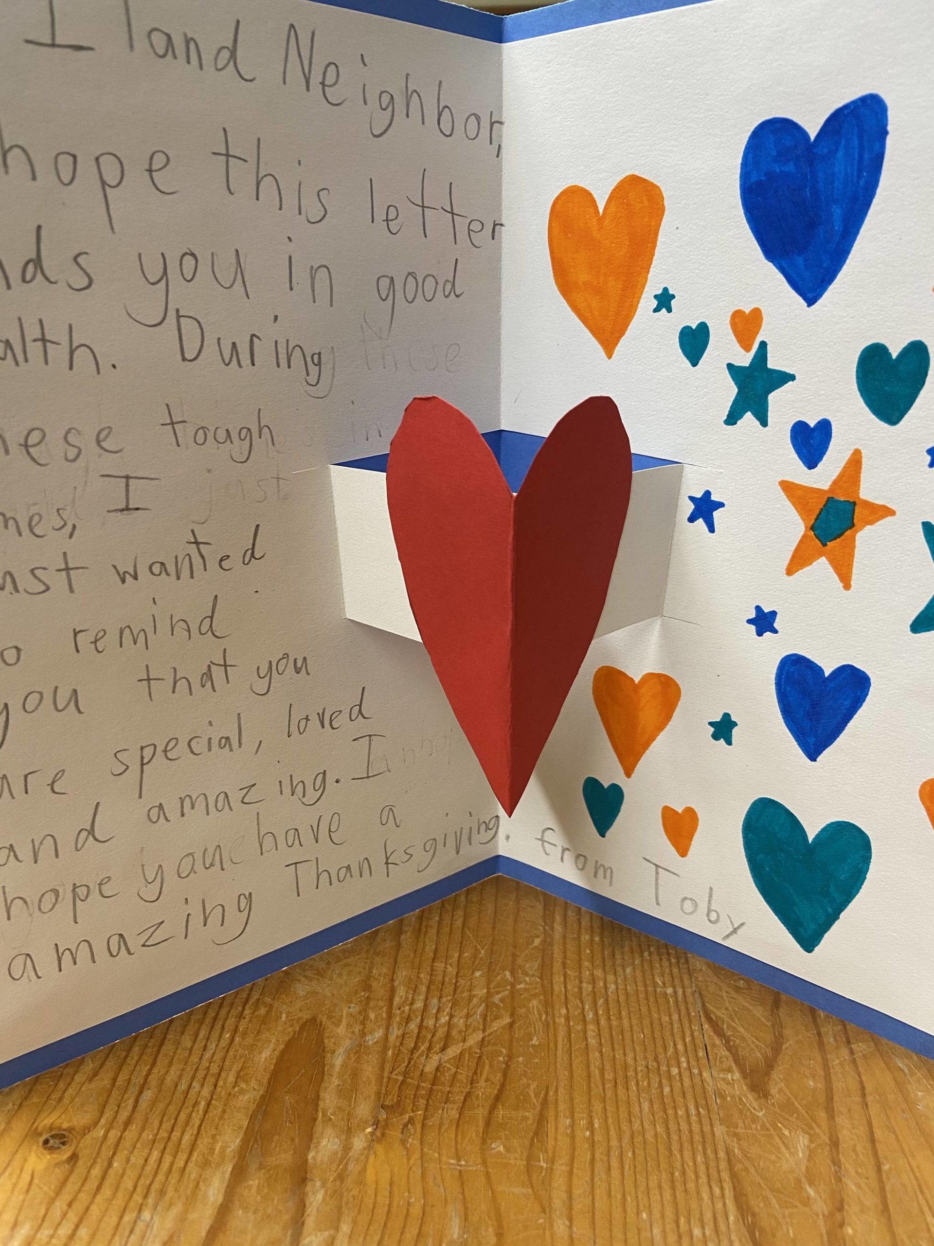 One of the cards made by a student to be sent along with dinner to someone in need on Thanksgiving Day.