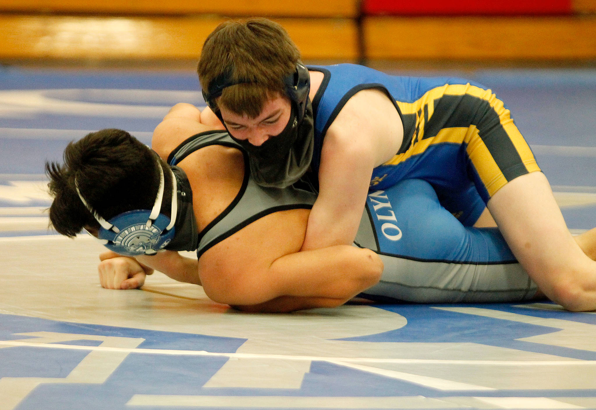 Harrison Cate won both of his matches in the recent wrestling meet against Kingston and Olympic. (Mark Krulish/Kitsap News Group)