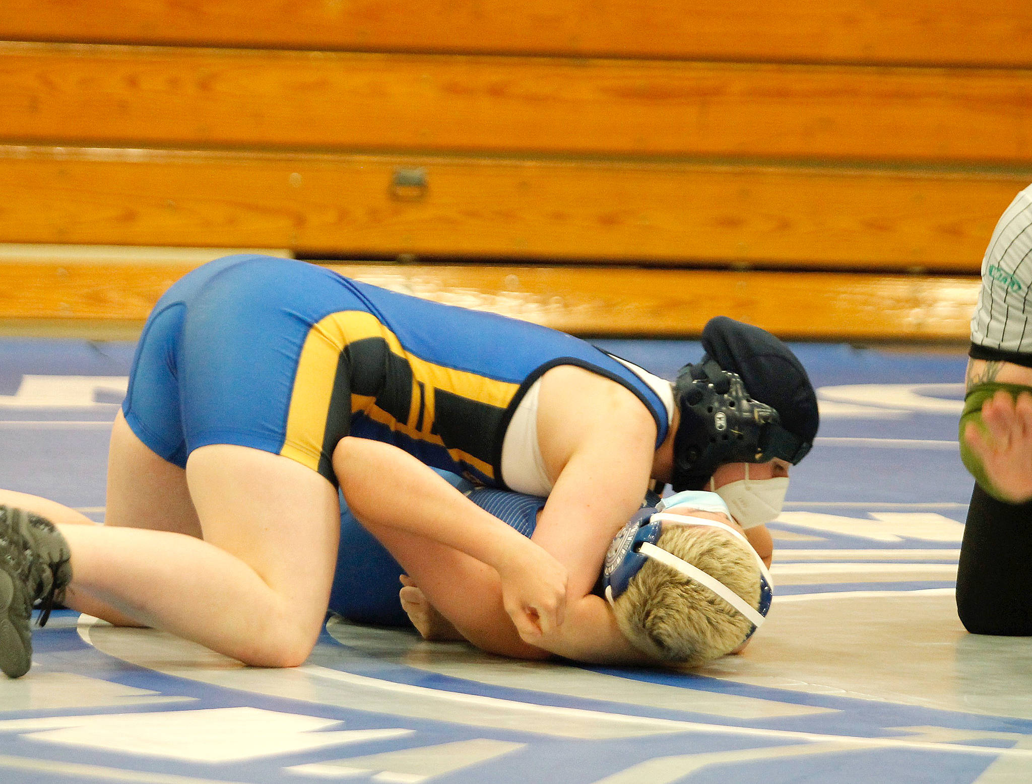 Caroline Michaels wrestled the lone girls match against Olympic and won via pin. (Mark Krulish/Kitsap News Group)