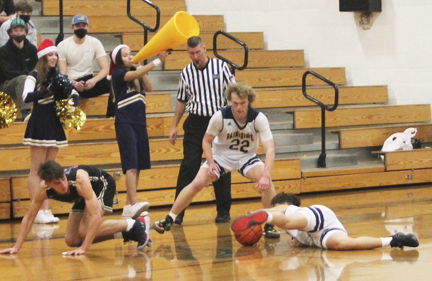 A Spartan seems to control the ball with his foot as Braydon Morgan (22) goes to try to control it.