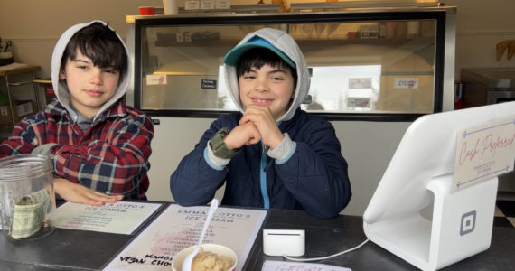 Courtesy Photos
Twin scoopers, Noah and Lucas Rudolph, helping out at Emma & Otto’s Ice Cream, which opened last month on Winslow Way.