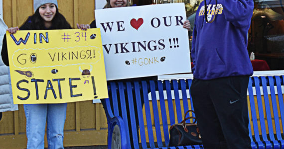 Carter Dungy’s family and friends cheered the team as they were escorted through downtown Poulsbo early Dec. 3. Nicholas Zeller-Singh/Kitsap News Group Photos.