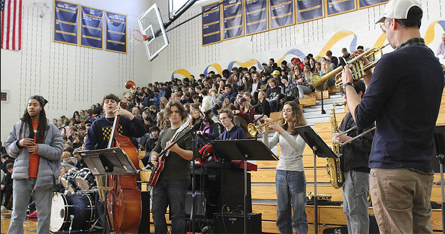 Isaiah Banks sings 'Lift Every Voice and Sing,' accompanied by the BHS Jazz Band, at the MLK assembly.