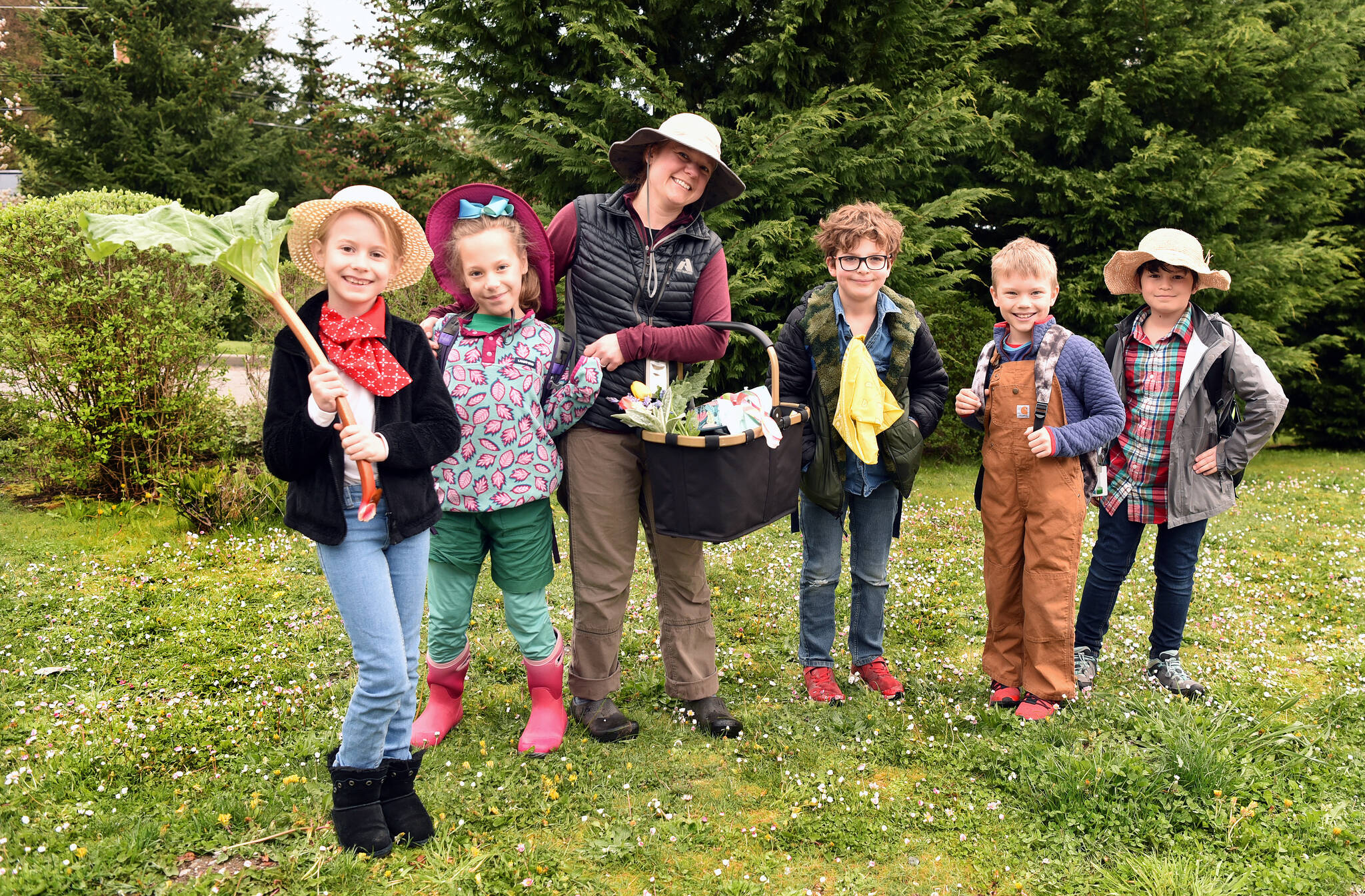 Wilkes Elementary students Oona Leigh, Eloise Wood, third-grade teacher Lisa Wood, Sawyer Platt, Emery Tarter and Maxwell Newman dress as farmers during the Bainbridge Island School District's Kindness Week  April 24-30. Nancy Treder/Kitsap News Group