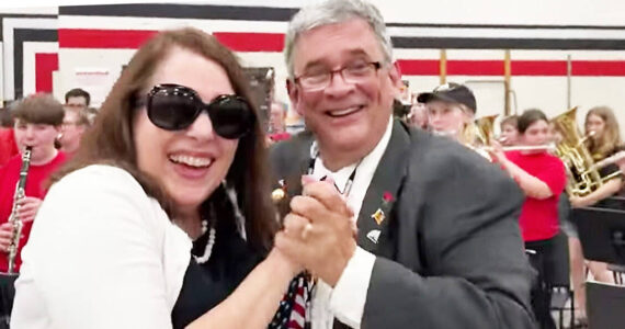 Kingston Middle School band director Jeff Haag and his wife Kathleen dance to 'Louie Louie' as his final sendoff. NKSD courtesy photos