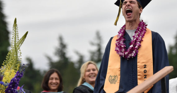 Colin Black lets out a yell after delivering his class speech. Nancy Treder/Kitsap News Group Photos