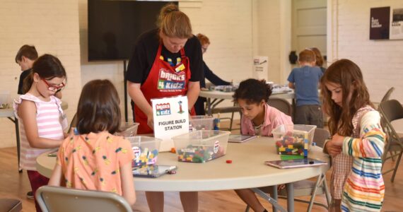 Children in the Bricks 4 Kidz parks department summer camp enjoy creating things with Lego bricks on July 3 in the Fort Ward Community Hall. Nancy Treder/Kitsap News Group Photos