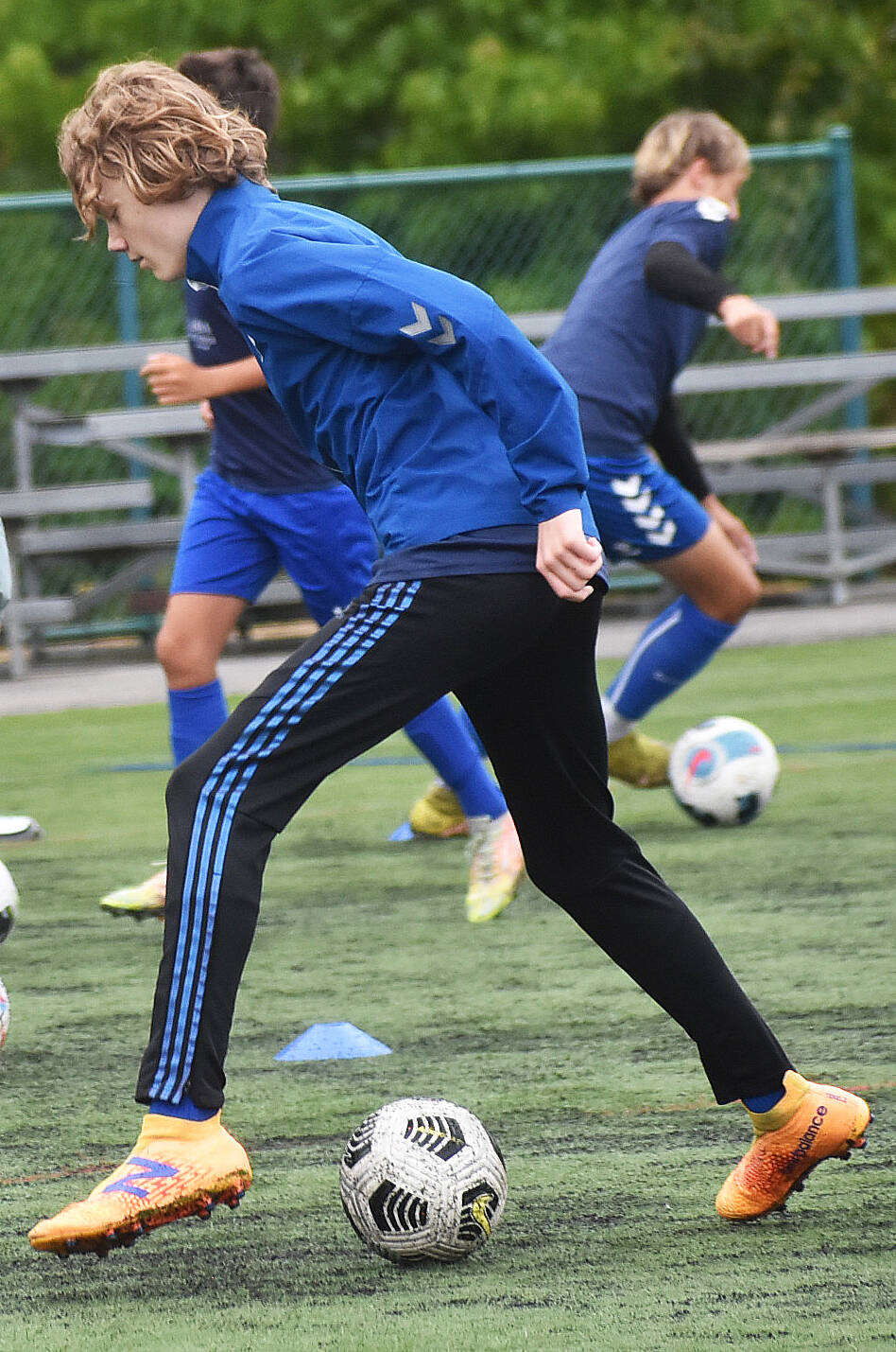 Max Barry works on his dribbling skills at the Everton Camp held by BIFC.