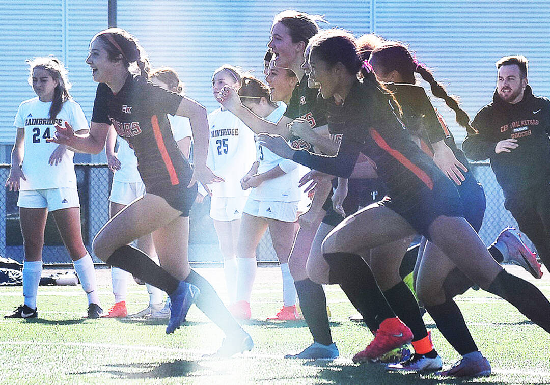 Central Kitsap celebrates its penalties victory against Bainbridge.