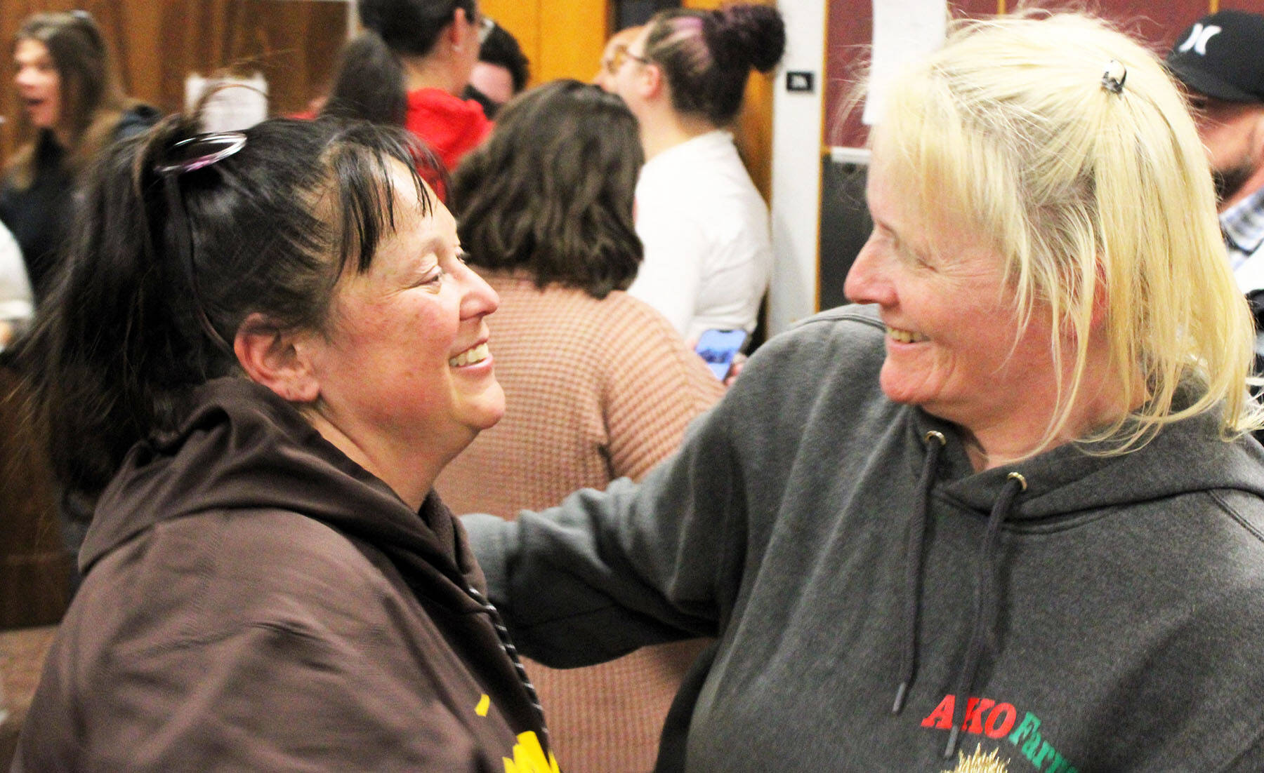 Rebecca Careaga, left, shares an emotional hug with Sunshine Golden outside the courtroom.