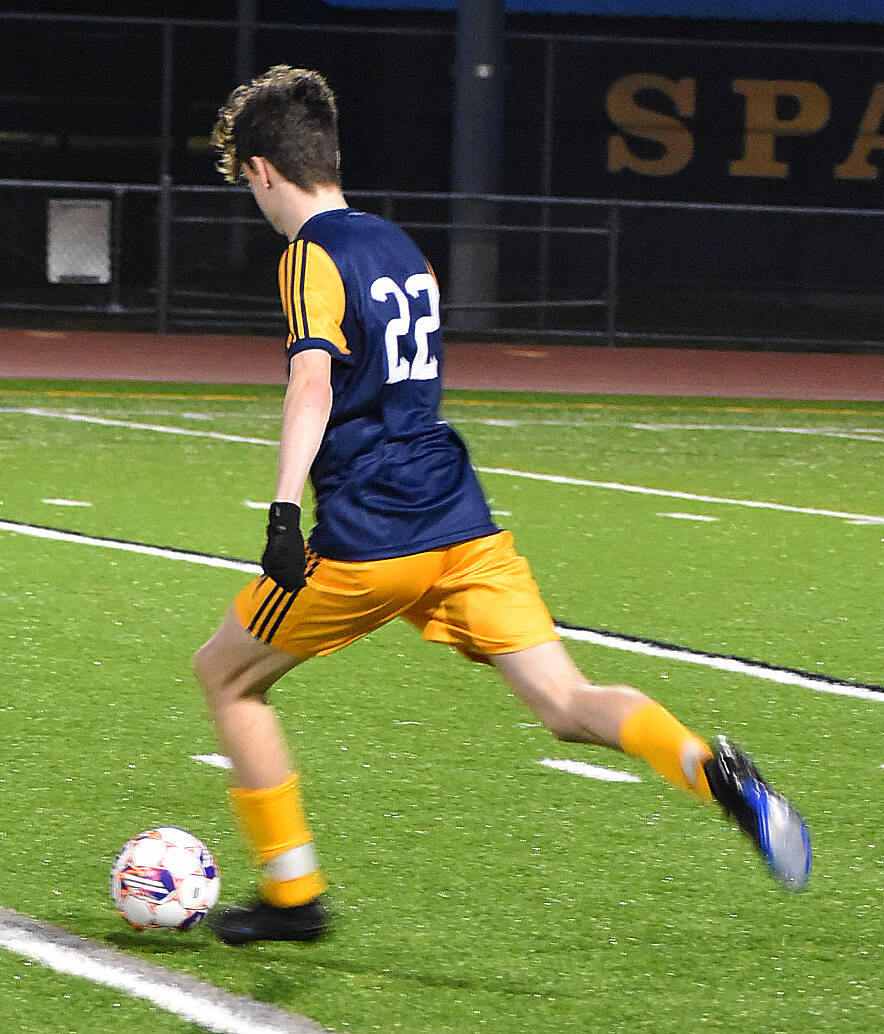 File photo
Finn McCallum pushes the ball upfield on a counterattack for Bainbridge.