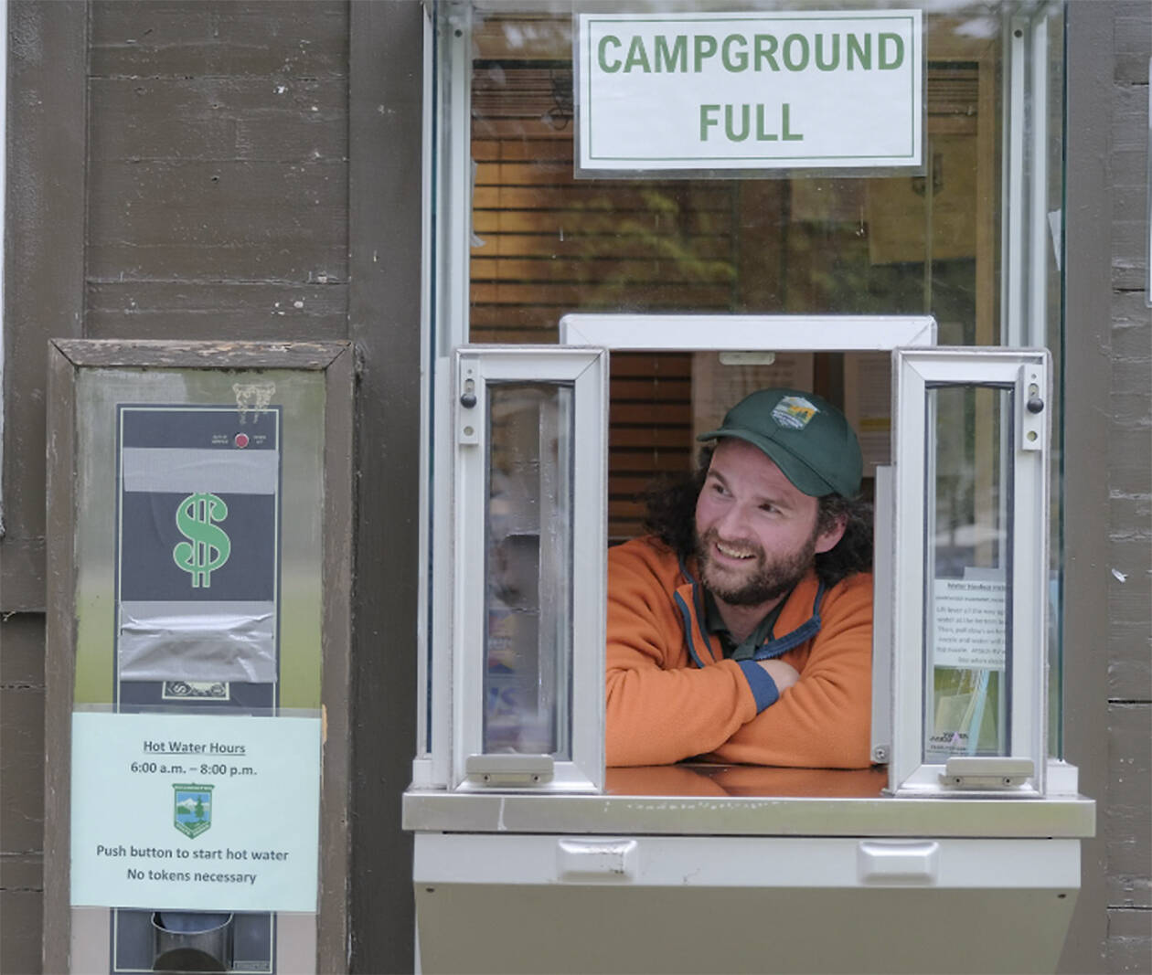 Park aide Zach King tells visitors all about the campground.