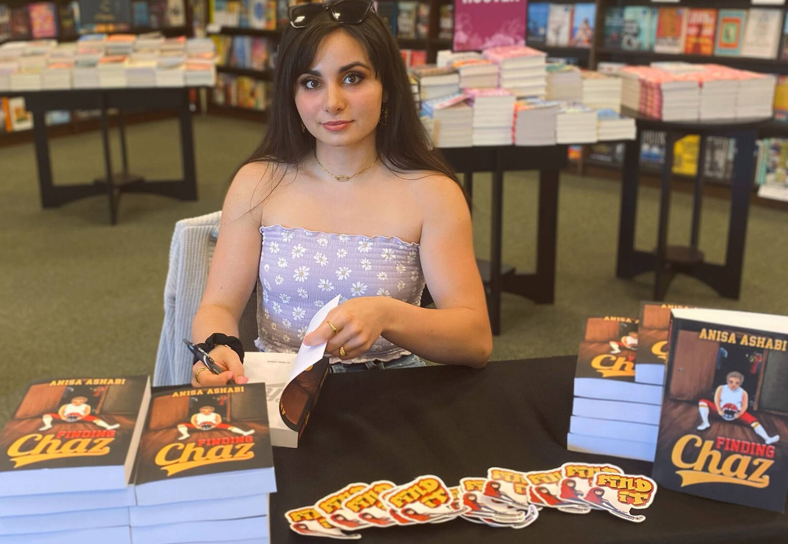 Anisa Ashabi courtesy photo
Anisa Ashabi signing copies of her novel Finding Chaz.