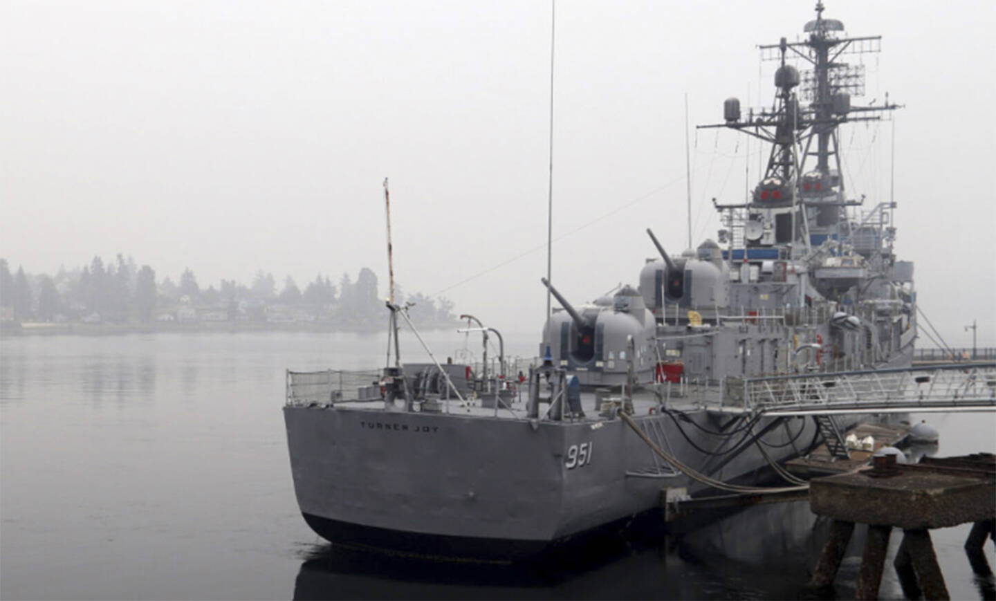 This Navy ship in Bremerton is surrounded by smoke from a wildfire.