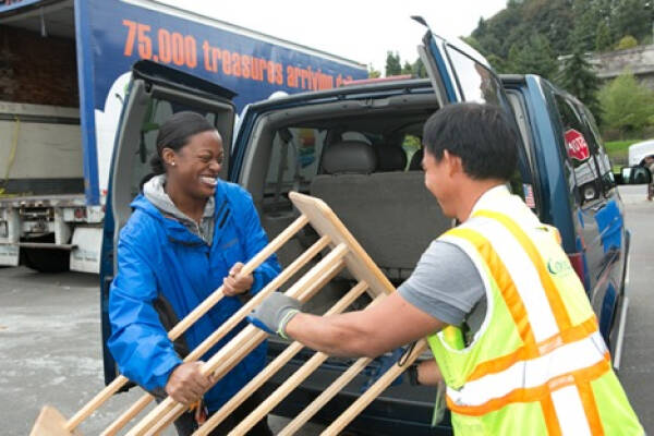 Evergreen Goodwill courtesy photo
A Goodwill employee assists a customer with a large donation at the Bainbridge Island Donation Center.